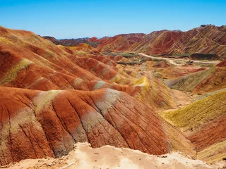 Wall murals Zhangye Danxia Colorful rock strata in sedimentary rocks - The Rainbow Mountains of China within the Zhangye Danxia Landform Geological Park