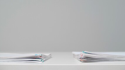Time lapse of paper sheets on white background. Stop motion animation of blanks business documents...