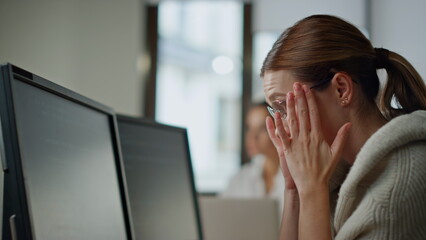 Software developer thinking solution closeup. Stressed woman programming analyze