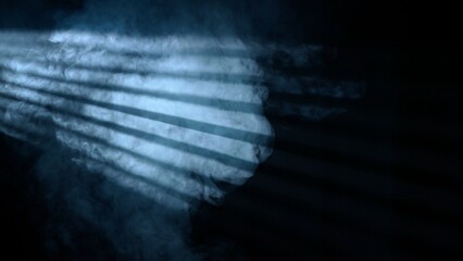 Studio shot of projector haze jalousie effect isolated on black background. Blue light rays shining...