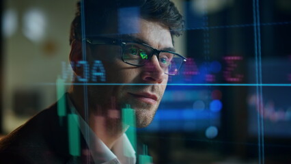 Closeup financial manager thinking strategy. Hologram stock market statistics.