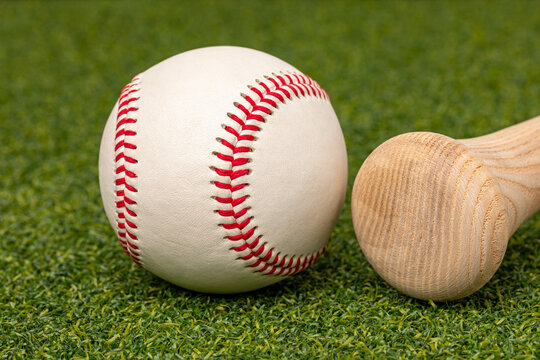 Baseball and wooden bat. Recreational, youth and professional sports concept.