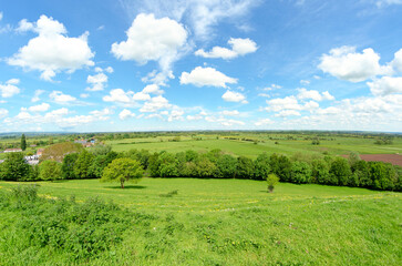 Views from Burrow Mump overlooking the surrounding countryside of Southlake Moor in Burrowbridge Somerset on a sunny day
