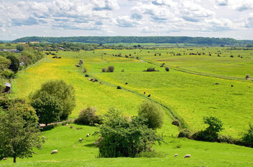 Views from Burrow Mump overlooking the surrounding countryside of Southlake Moor in Burrowbridge Somerset on a sunny day
