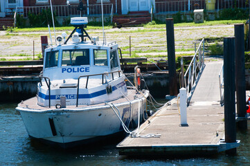 Obraz premium American police boat on the pier