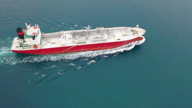 LPG Carrier underway calm ocean waters. Liquefied Petroleum Gas tankers designed to carry butane, propane, butadiene, propylene, vinyl chloride monomer and ammonia. Aerial view, Drone shot
