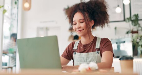 Coffee shop, laptop and woman with online education, e learning and research for essay, registration or course sign up. African student or customer typing on computer for internet service at a cafe