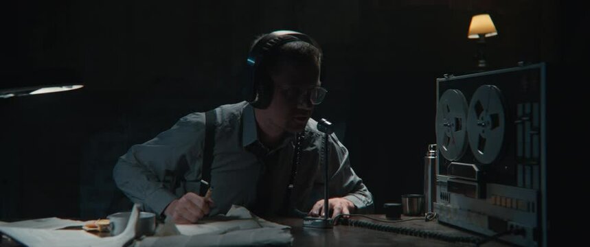 A spy works at the wiretap station