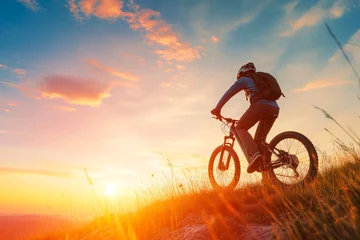 Zelfklevend Fotobehang Man riding electric bike in sunset. New type of recreation for all population. E-bike power takes you everywhere. © VisualProduction