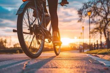 Gordijnen Man riding electric bike in sunset. New type of recreation for all population. E-bike power takes you everywhere. © VisualProduction