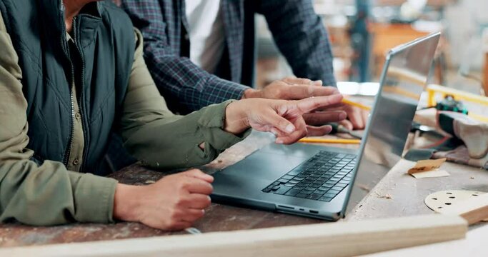 Teamwork, hands and carpenter with laptop in workshop manufacturing or engineering project. People planning, woodwork or workers in warehouse for talking or speaking of building timber production