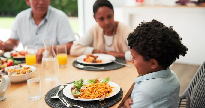 Food, no and disgust with family at lunch for vegetables, nutrition and thanksgiving event. Health, picky and holiday with people at table of dining room at home for eating, salad and brunch