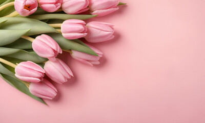 Beautiful composition spring flowers. Bouquet of pink tulips flowers on pastel pink background. Valentine's Day, Easter, Birthday, Happy Women's Day, Mother's Day. Flat lay, top view, copy space