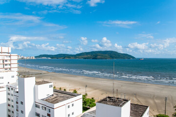Fototapeta premium Blue Skies Over Tropical Beach Along Coast of Santos Sao Paolo Brazil