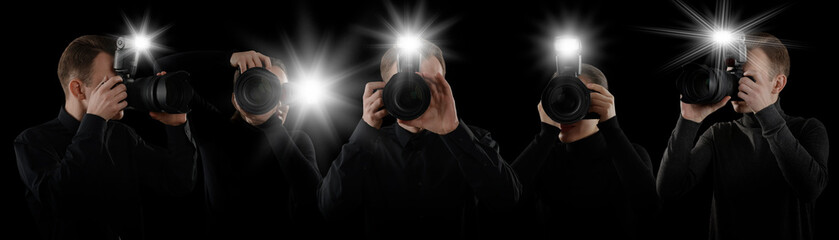 Group of photographers with cameras on black background, banner design. Paparazzi taking pictures...