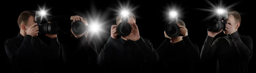 Fotobehang Group of photographers with cameras on black background, banner design. Paparazzi taking pictures with flashes © New Africa