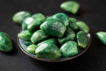 traditional Chinese food Laba garlic pickled garlic on black background.