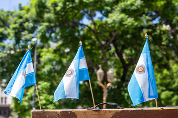 Small Argentine flags for sale on the street as souvenirs. Buenos Aires, Argentina