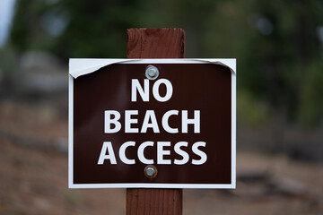 "No Beach Access" Sign on post 
