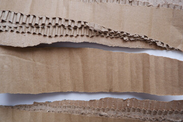 Torn cardboard paper for using as a text box. torn cardboard paper for background and design material.