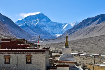 Serene Rongbuk Monastery, nestled amidst the towering peaks of Tibet, offers a breathtaking vista...