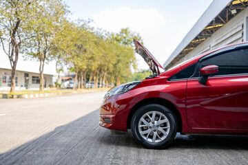 car repair in garage service station with soft-focus and over light in the background