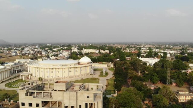 Profile view of Indian Institute of Management, Bodh Gaya during sunny day in Bihar. Drone Shot.