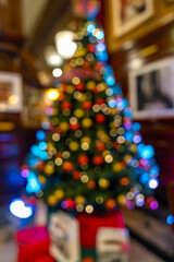 Fototapeta na wymiar christmas tree with gifts and decorations, defocus, blur