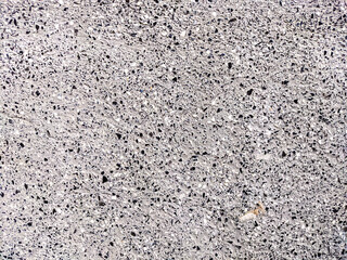 Small stone pebbles wall texture background