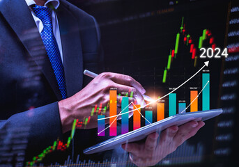 Businessman showing growing virtual holographic stock,positive indicators, businessman calculates...