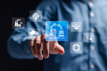 Smart industry 4.0 concept, Businessman touch virtual screen of physical system, smart industrial revolution, automation, robot assistants, iot, cloud and bigdata.
