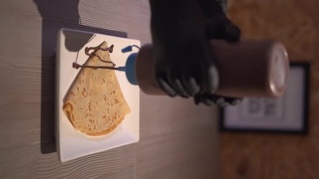 preparing pancakes with chokolate vertical video
