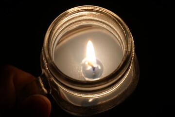 candle in hand