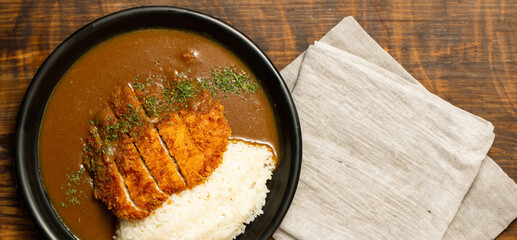 Pork cutlet with delicious Curry sauce on a plate