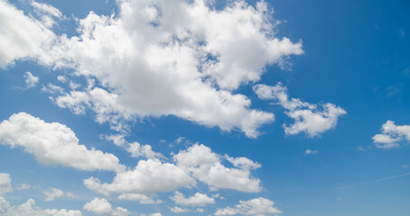 Panoramic view of clear blue sky and clouds, Blue sky background with tiny clouds. White fluffy...