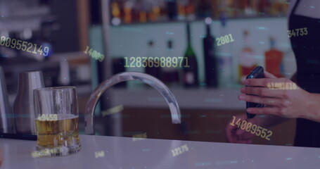 Image of data processing over biracial woman paying with credit card