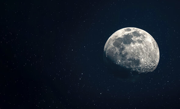 The moon in the starry sky close-up. Hyper-realistic photo.