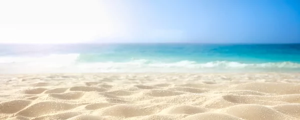 Schilderijen op glas Beautiful sandy beach and sea with clear blue sky background Amazing beach blue sky sand sun daylight relaxation landscape . Summer and travel background © Celt Studio