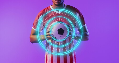 Image of african american male soccer player over scope scanning