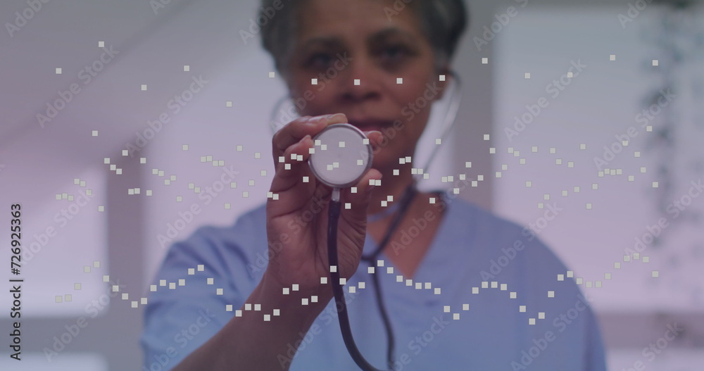 Sticker Image of spots over african american female doctor with stethoscope