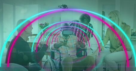 Image of circles over diverse group of seniors using vr headset