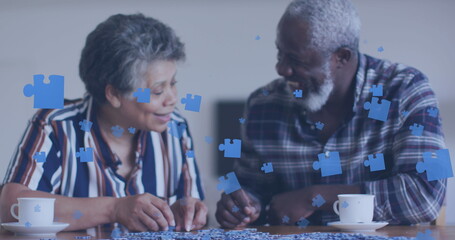 Image of puzzle over senior african american couple talking - obrazy, fototapety, plakaty