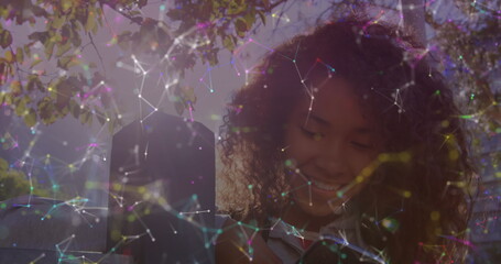 Image of network of digital icons over woman using smartphone