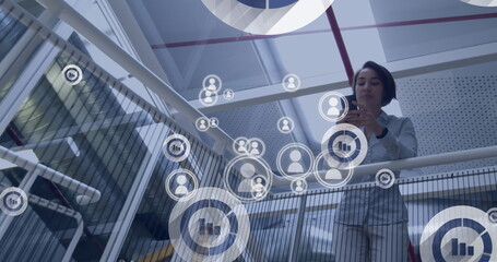 Image of digital icons over woman using smartphone