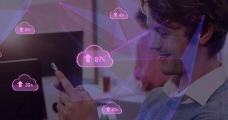 Plexus networks and cloud uploading icons against caucasian man using smartphone at office