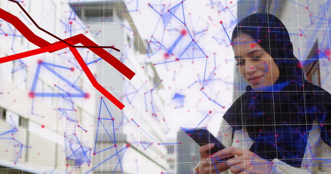Red graphs moving and network of connections against woman in hijab using smartphone - Powered by Adobe