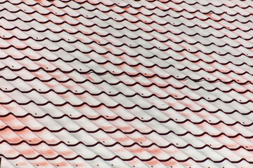 Metal tiles on the roof as an abstract background. Texture