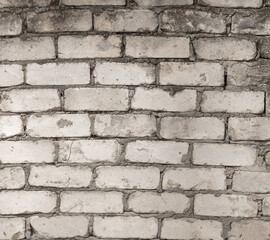 Old bricks in the wall as an abstract background. Texture