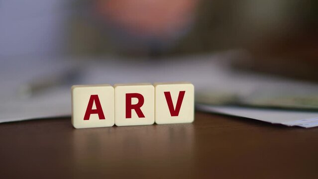 Concept of After Repair Value. ARV initials with selective focus and money on the background