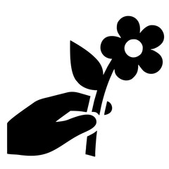silhouette of a person holding a flower